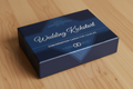 a closed box of cards titled "wedding kickstart" on the outside. in blue